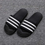 Three-Stripe Sport Slide Sandals – Black – Black / White product view